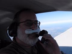 Dave breathing pure oxygen and making contacts on 2m FM at 11,000 feet somewhere over East Texas between Carthage and Alexandria, LA IMG_2082.JPG